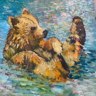 Björnungen badar
